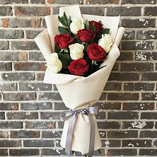 Букет цветов из:  Розы в Свече