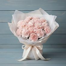 Букет цветов из:  Гвоздики в Свече