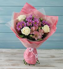 Букет цветов из:  Герберы в Свече