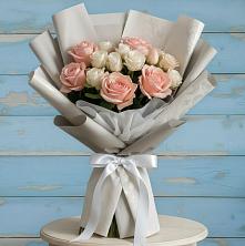 Букет цветов из:  Розы в Свече