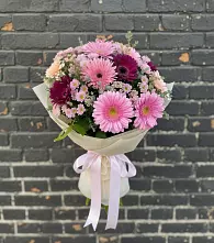 Букет цветов из:  Герберы и Хризантемы в Свече