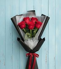 Букет цветов из:  Розы в Свече