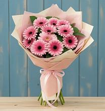 Букет цветов из:  Герберы в Свече